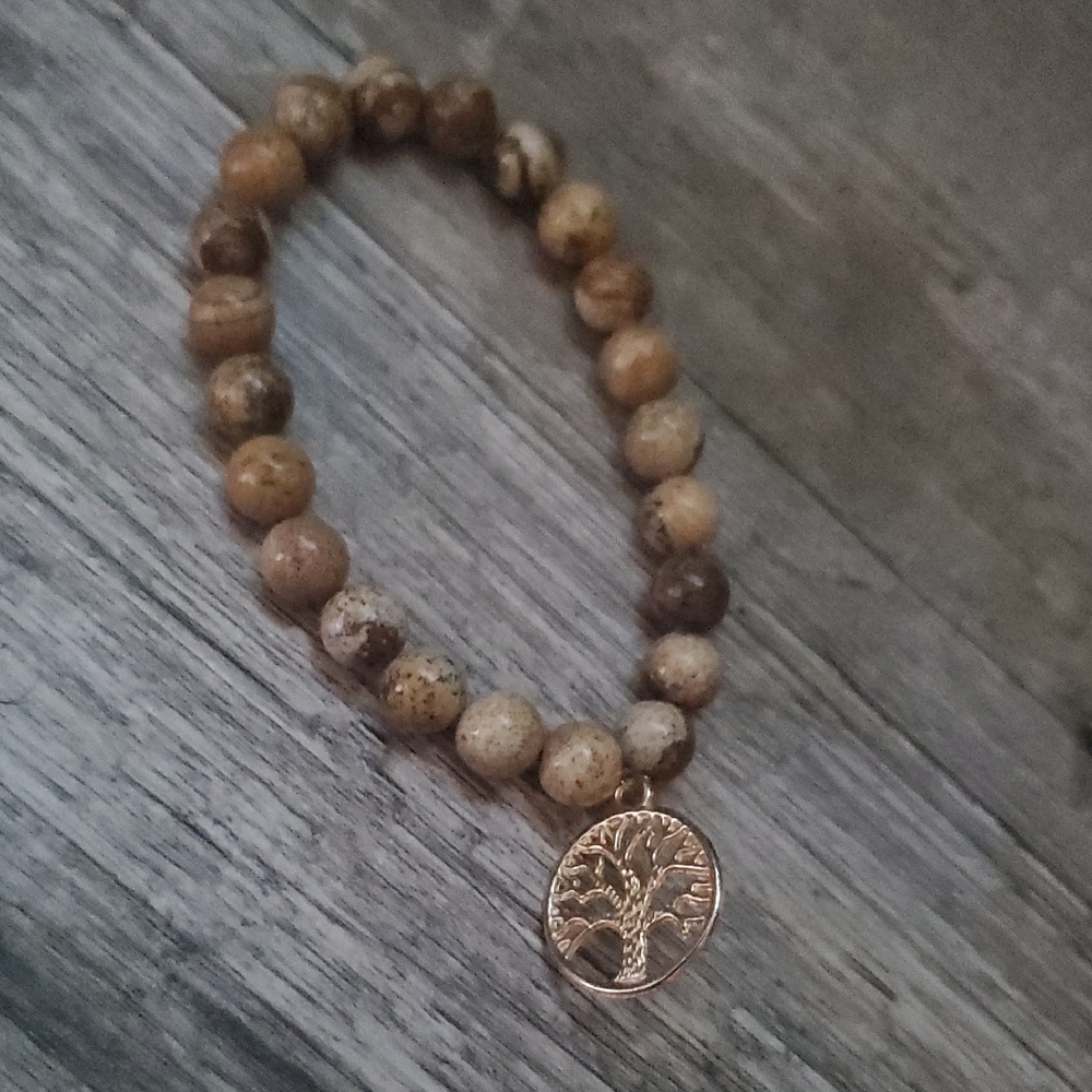 Handmade by my daughter. Brown beaded Tree of Life Bracelet